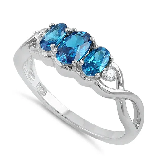 Sterling Silver Triple Oval Blue CZ Ring